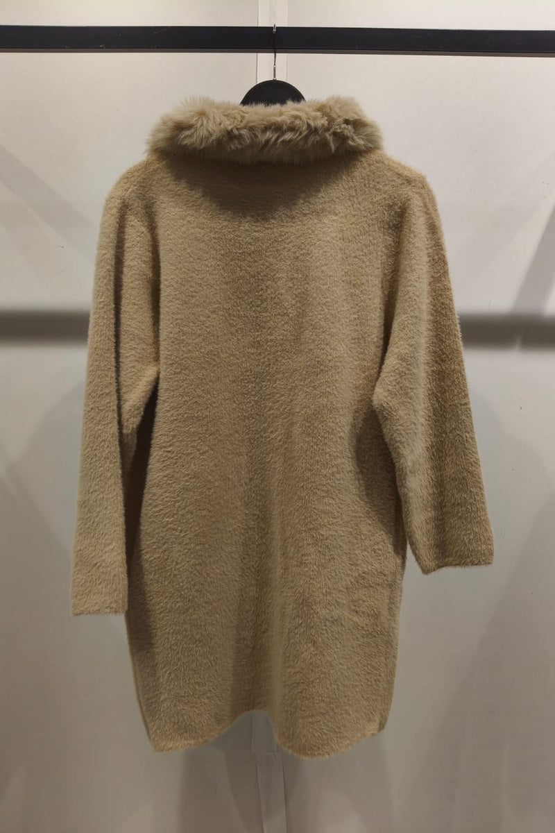 Manteau uni fausse fourrure avec poches