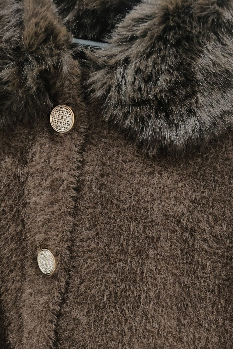 Manteau uni fausse fourrure avec poches
