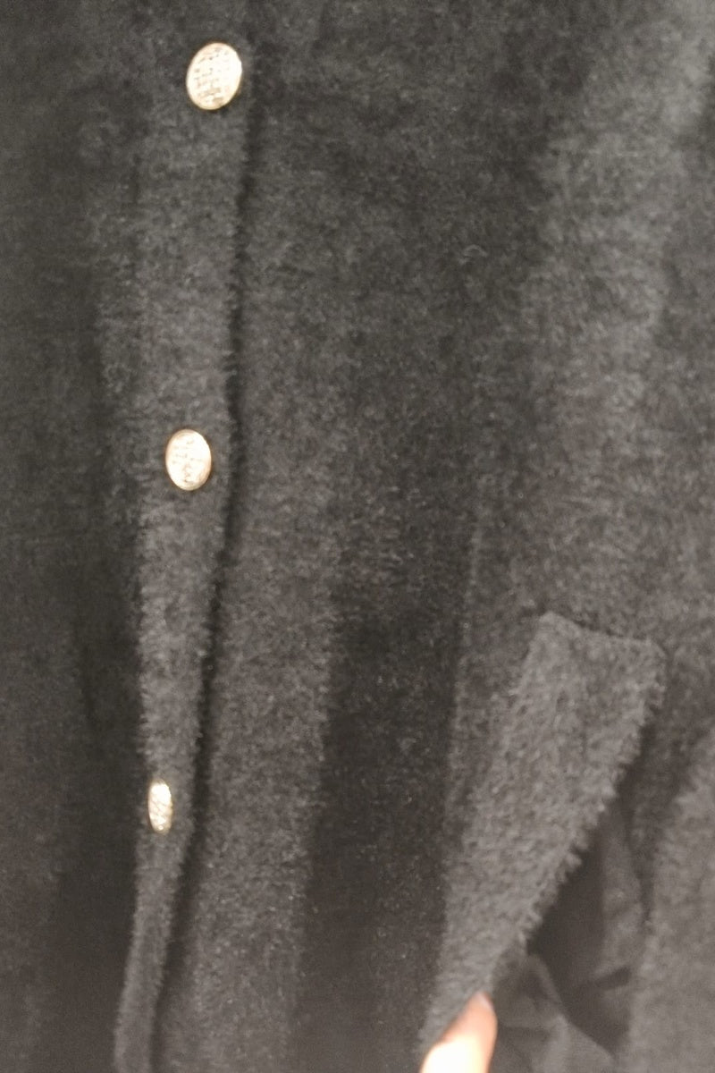Manteau uni fausse fourrure avec poches