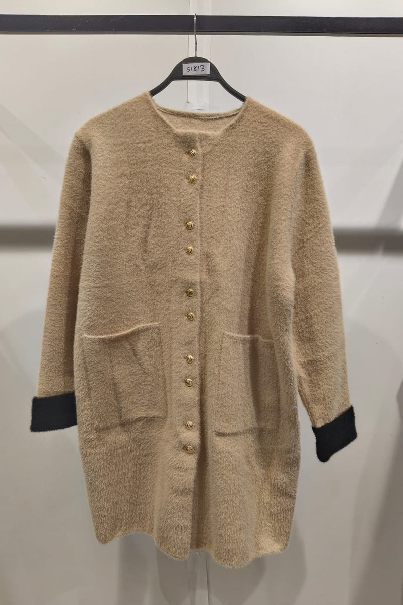 Manteau uni fausse fourrure avec poches