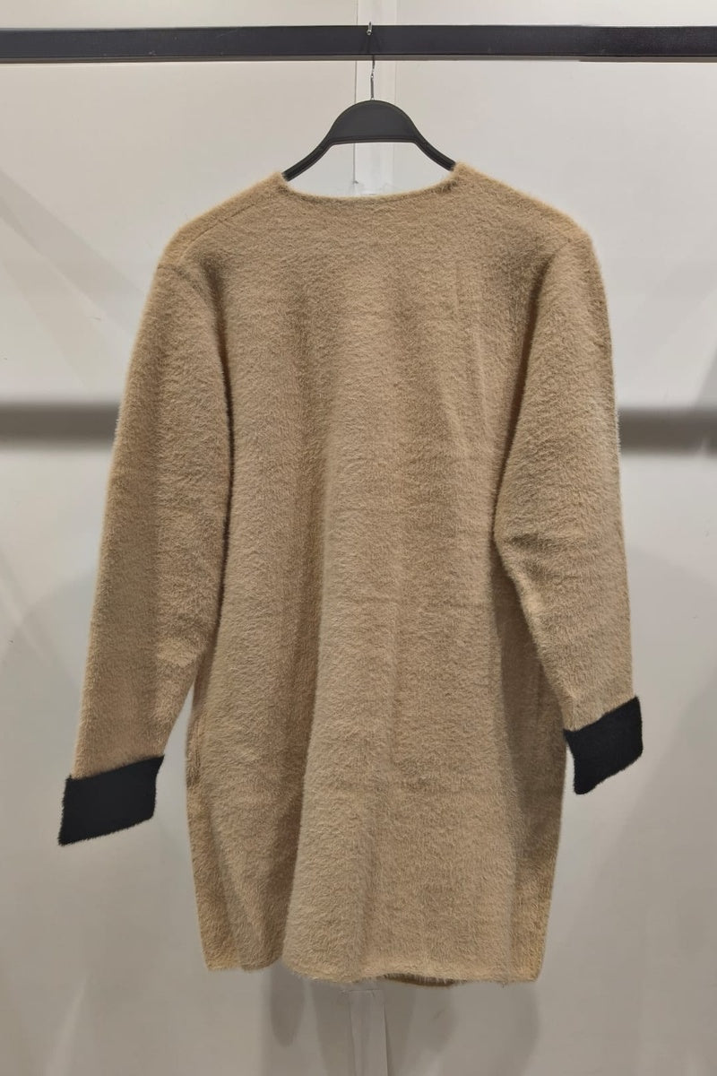 Manteau uni fausse fourrure avec poches