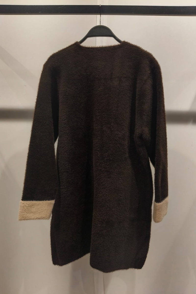 Manteau uni fausse fourrure avec poches