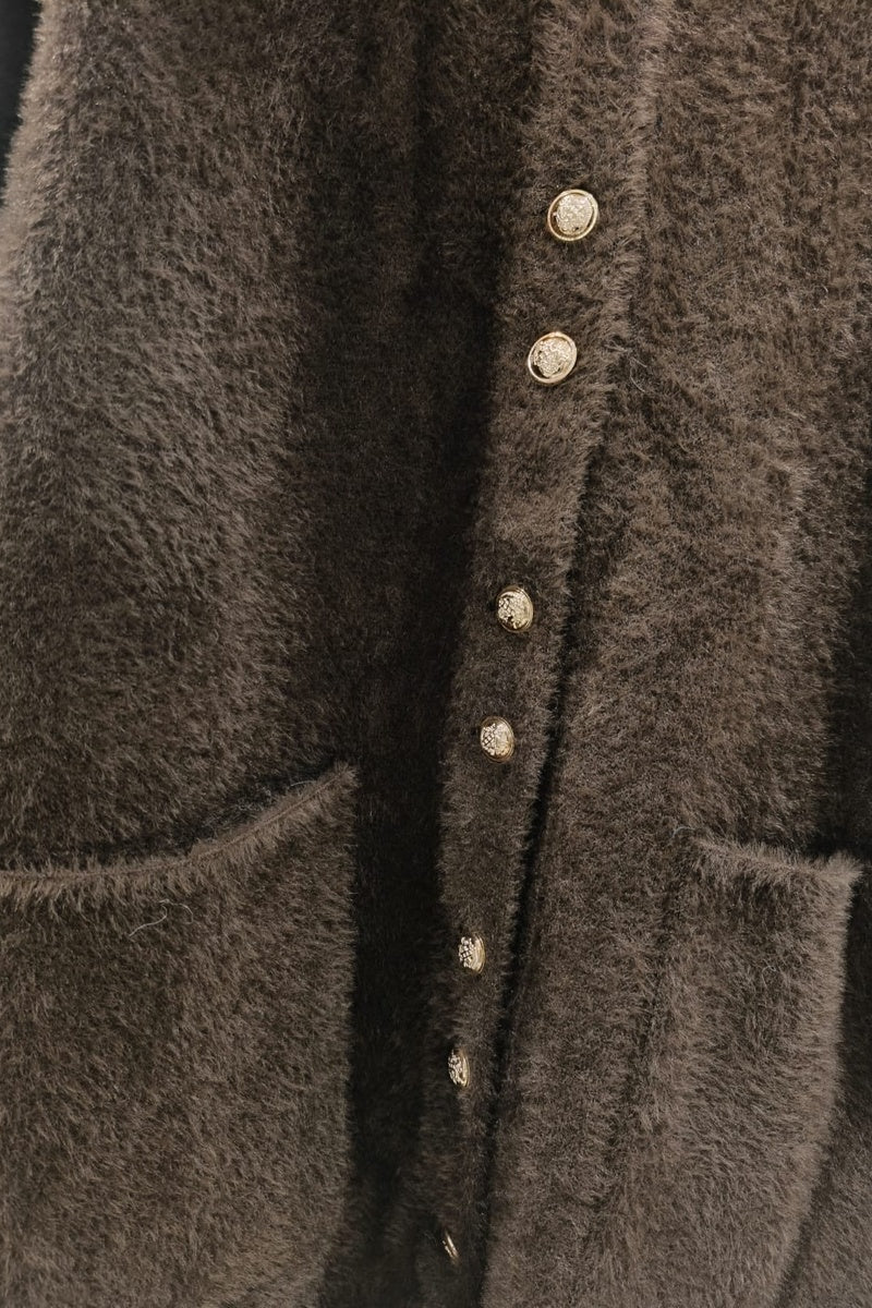 Manteau uni fausse fourrure avec poches
