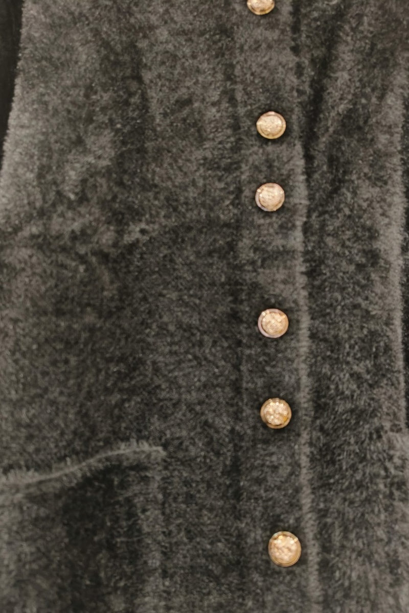 Manteau uni fausse fourrure avec poches