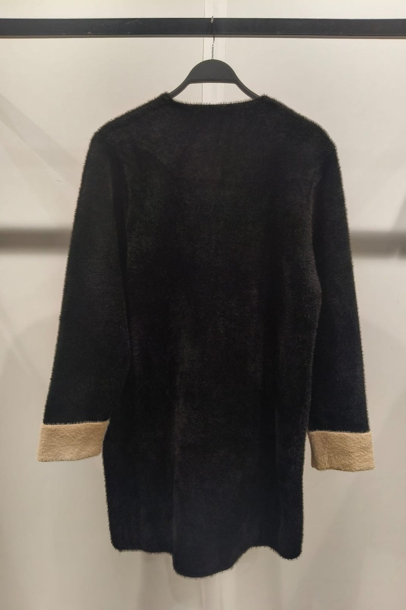 Manteau uni fausse fourrure avec poches