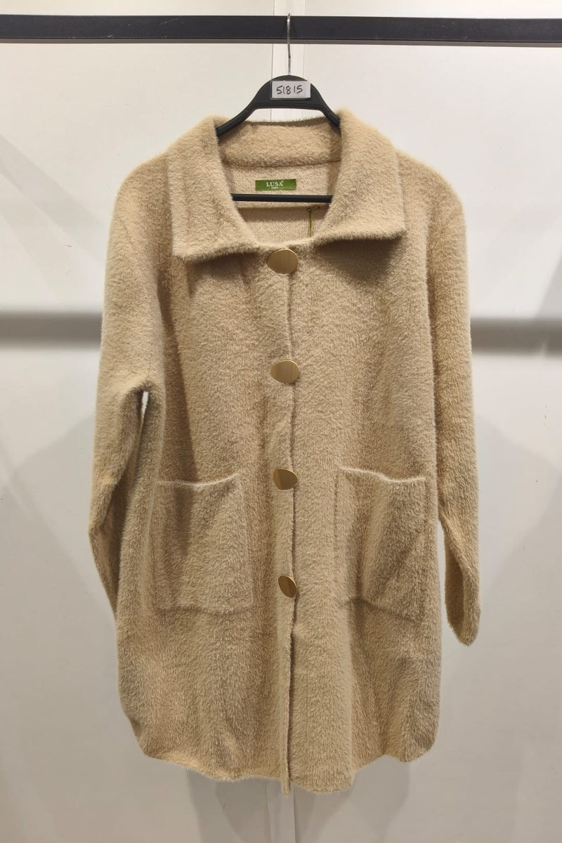 Manteau uni fausse fourrure avec poches