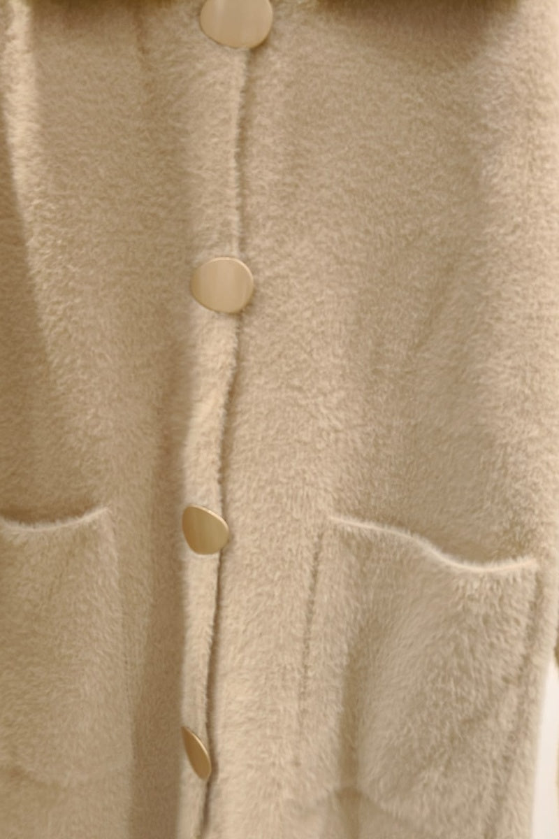 Manteau uni fausse fourrure avec poches
