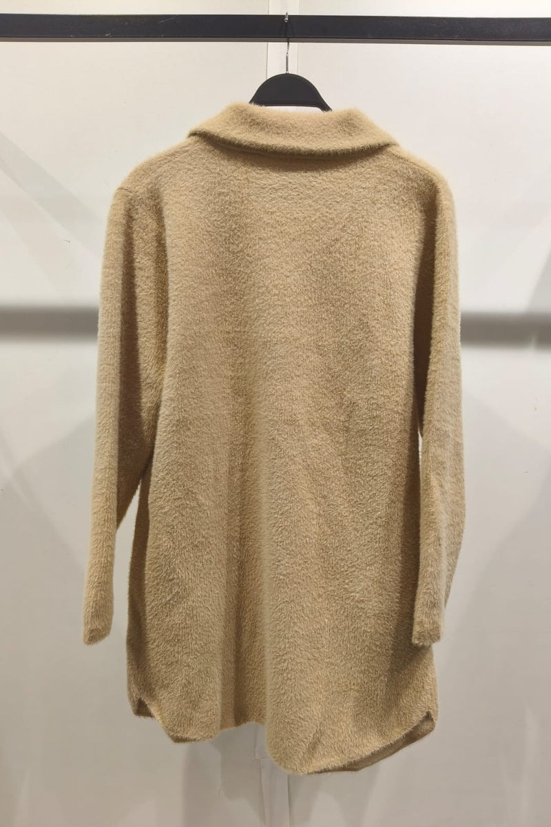 Manteau uni fausse fourrure avec poches