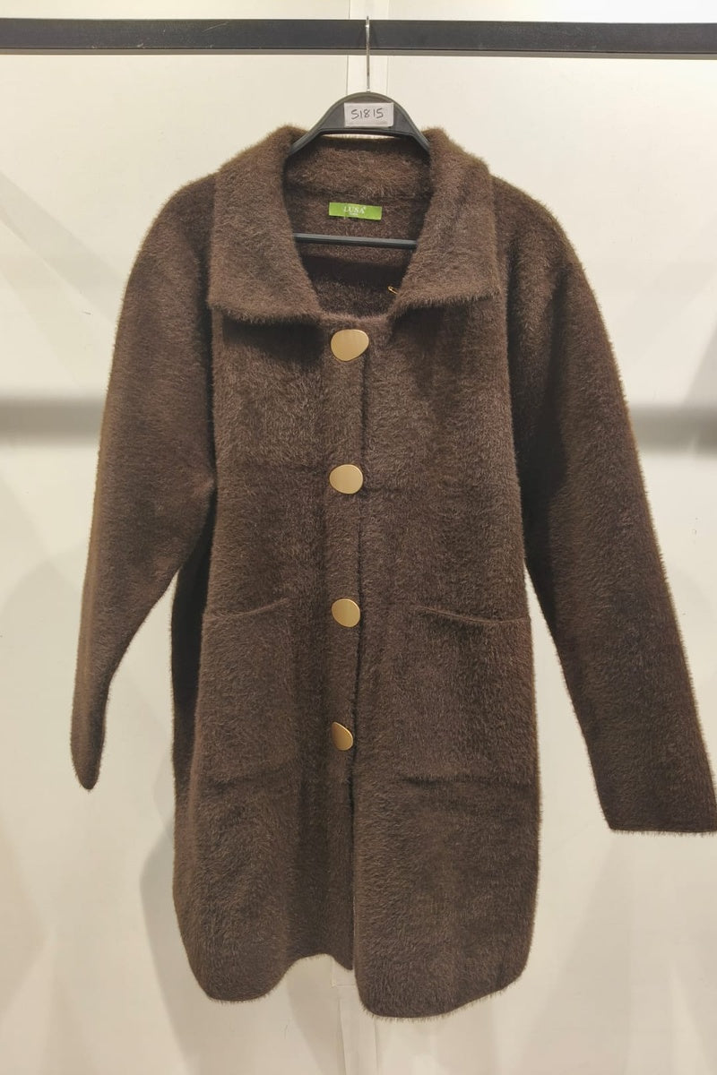 Manteau uni fausse fourrure avec poches