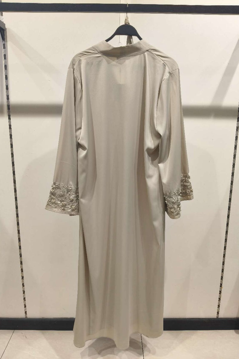 Abaya longue unie avec broderie fleurie perlée