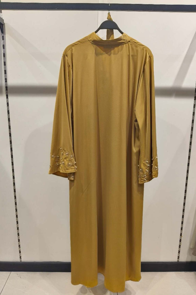 Abaya longue unie avec broderie fleurie perlée