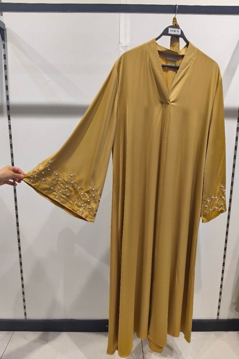 Abaya longue unie avec broderie fleurie perlée