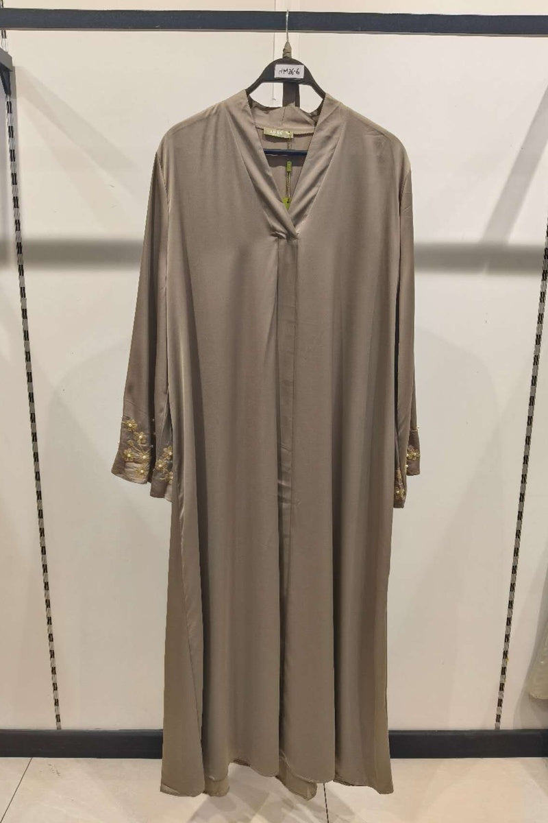 Abaya longue unie avec broderie fleurie perlée