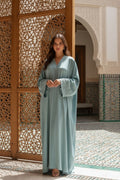 Abaya longue unie avec broderie fleurie perlée