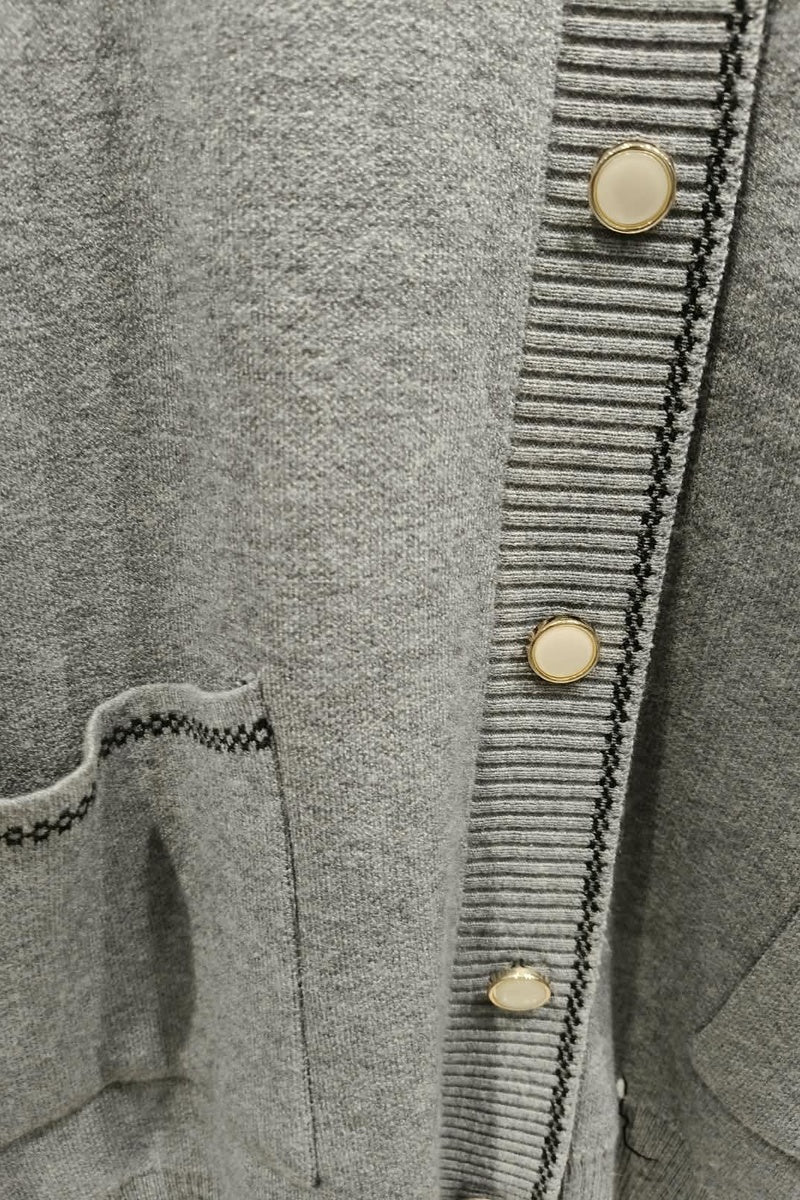 Gilet uni avec poches boutonné en maille fine