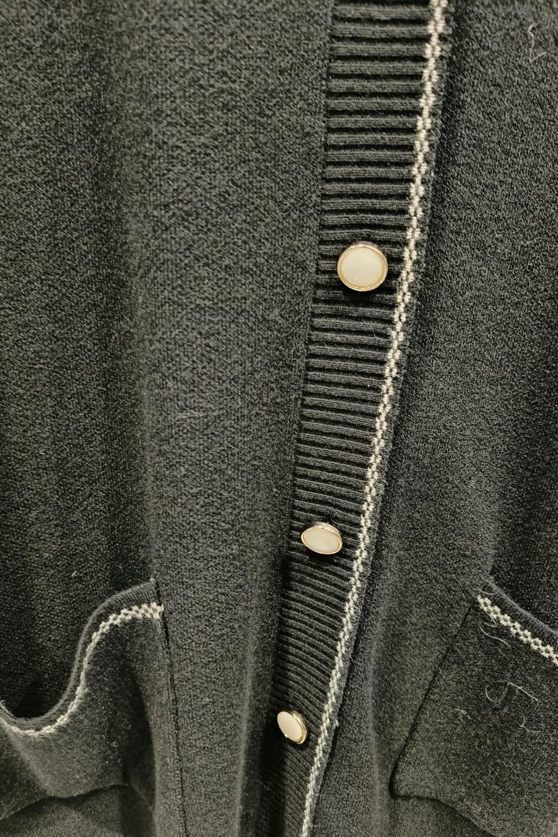 Gilet uni avec poches boutonné en maille fine