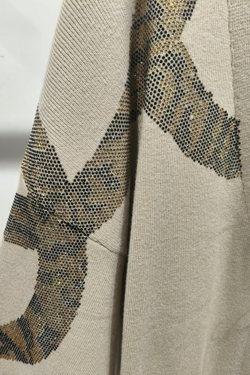 Gilet long à motif strass élégant avec poches et broche