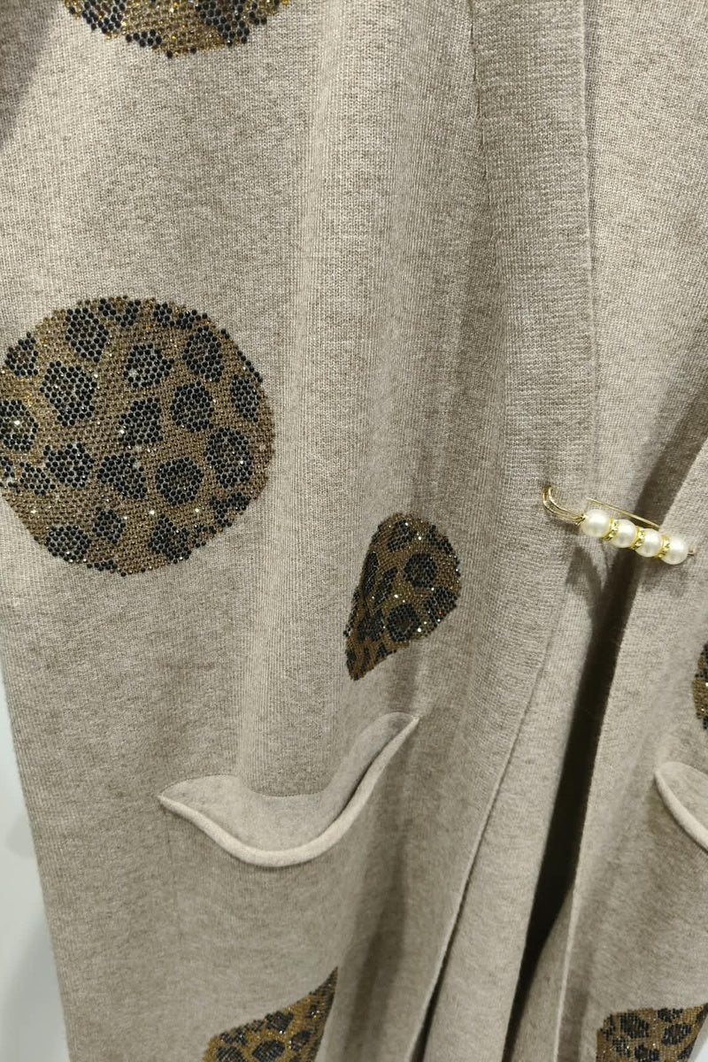 Gilet long à motif strass élégant avec poches et broche