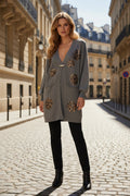 Gilet long à motif strass élégant avec poches et broche