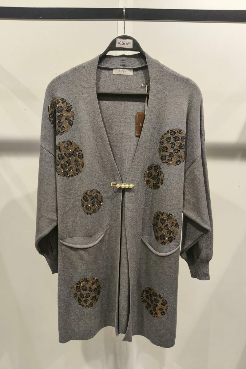 Gilet long à motif strass élégant avec poches et broche