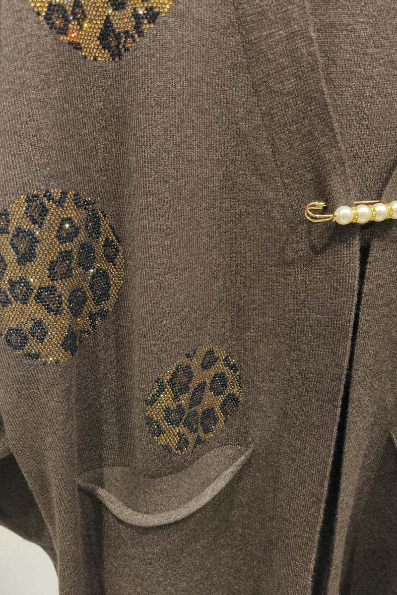 Gilet long à motif strass élégant avec poches et broche