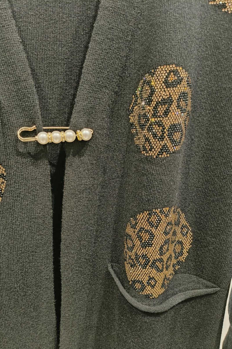 Gilet long à motif strass élégant avec poches et broche