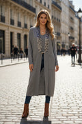 Gilet long à motif strass élégant avec poches et broche