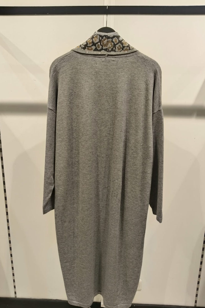Gilet long à motif strass élégant avec poches et broche