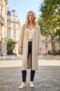 Gilet long uni en maille avec poches