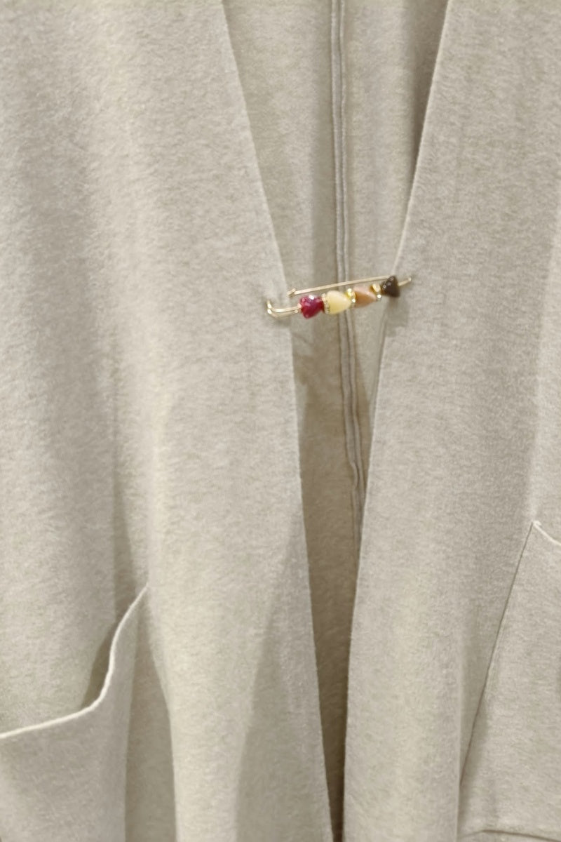 Gilet long uni en maille avec poches