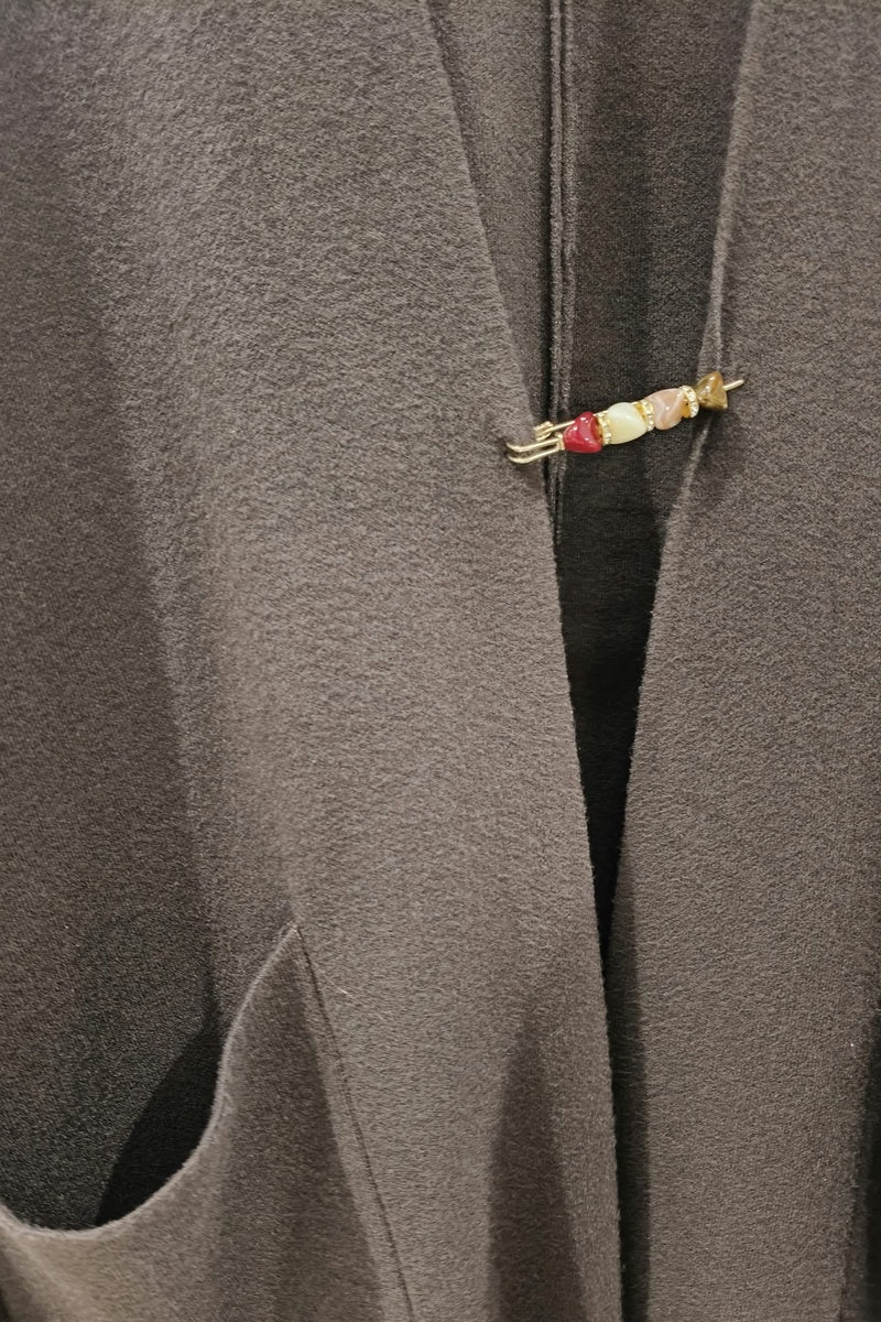 Gilet long uni en maille avec poches