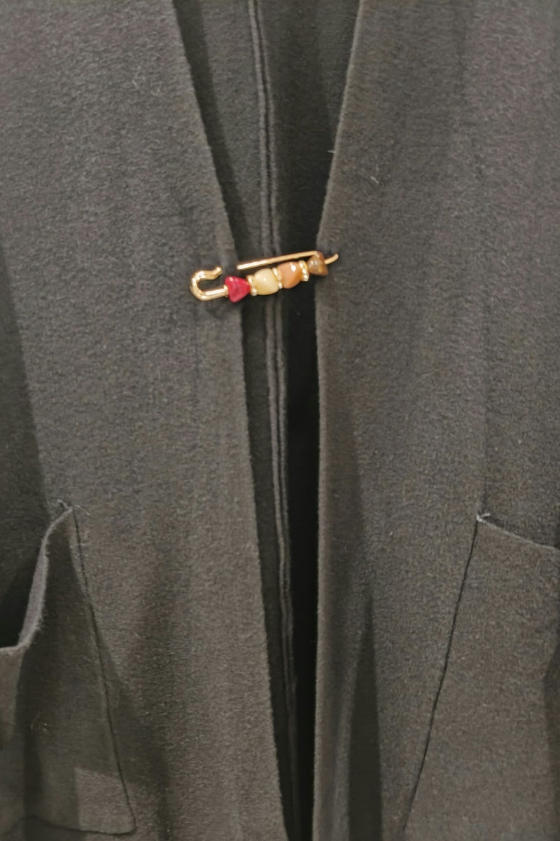 Gilet long uni en maille avec poches